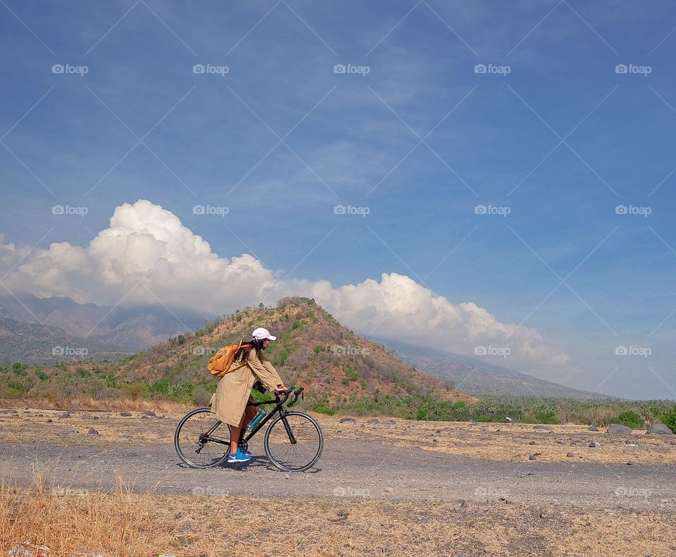 a women riding bycicle