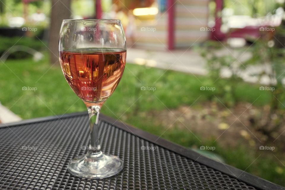 A glass of rose wine