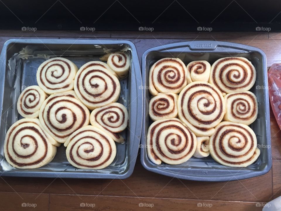 Homemade cinnamon rolls waiting to be baked 