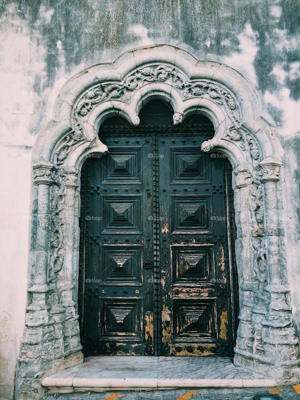 Beautiful door full of details in the old church in Elvas, Portugal 