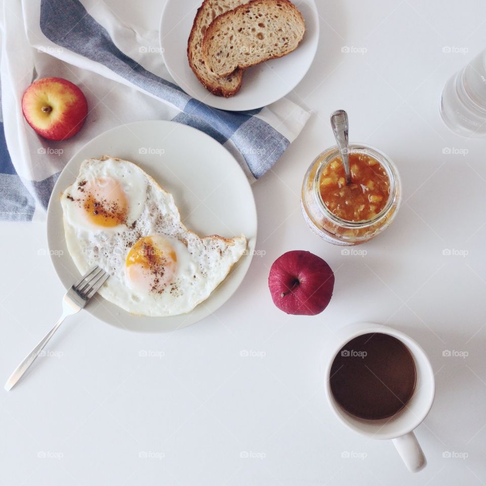 High angle view of coffee with omelette