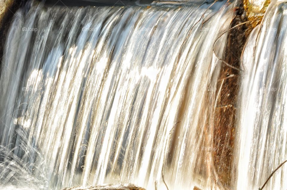 waterfall in the spring park in Poland