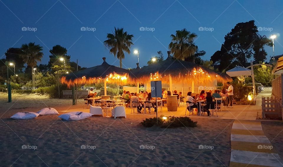 romantic beach dinner in the evening