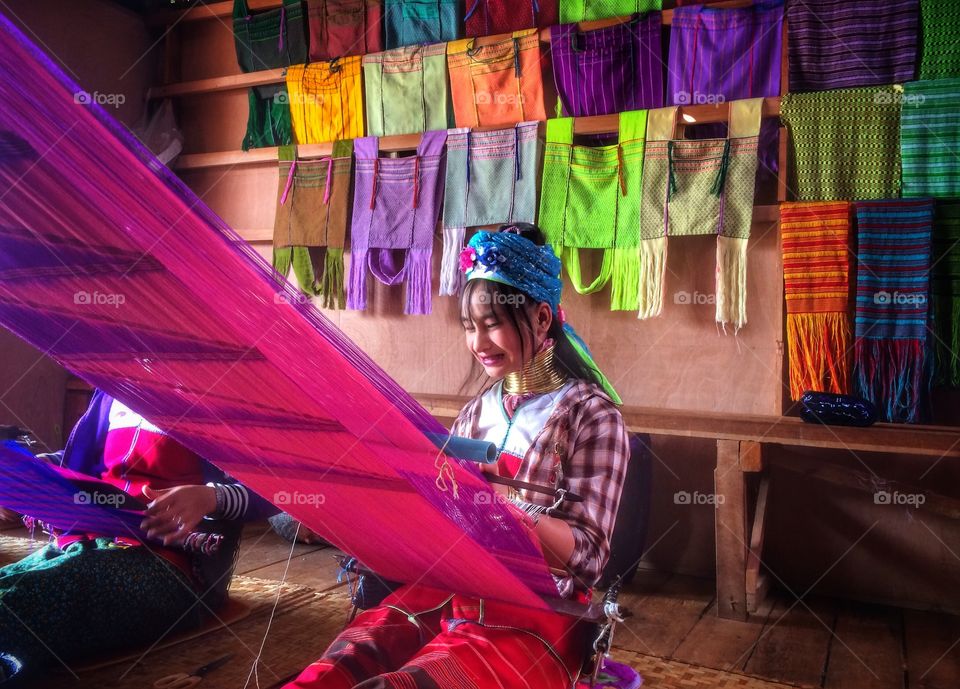 Burmese hill tribe woman working on handmade product