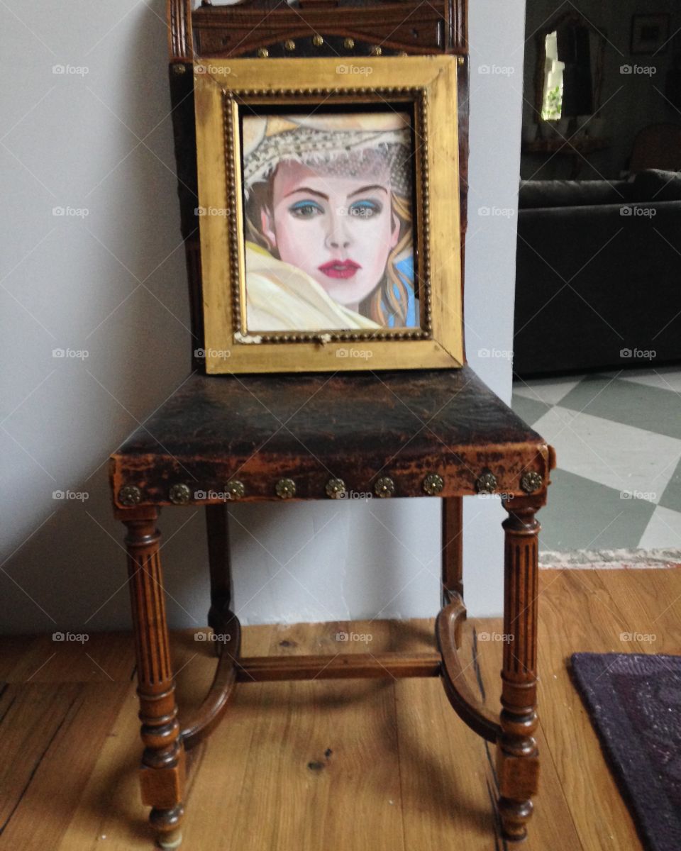 portrait on chair