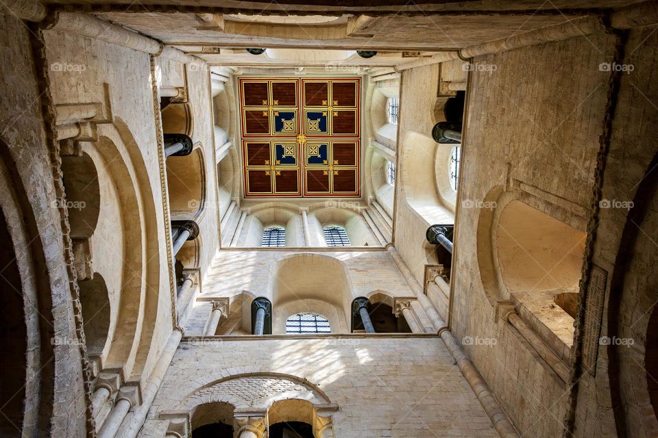 Looking up the interior to the modern wood ceiling of the Southwest Tower of Chichester Cathedral, UK