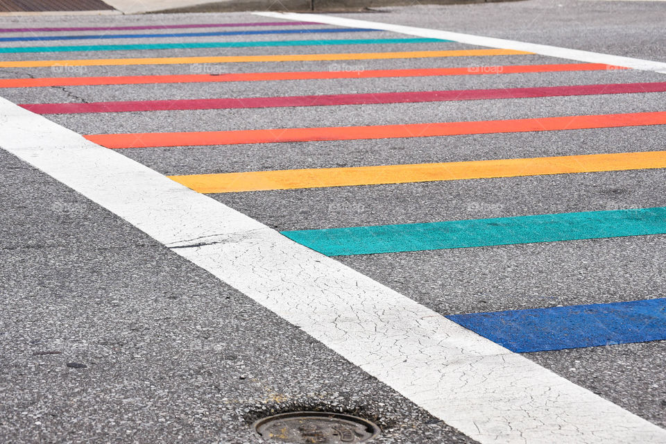 Rainbow colored crosswalk on a city street