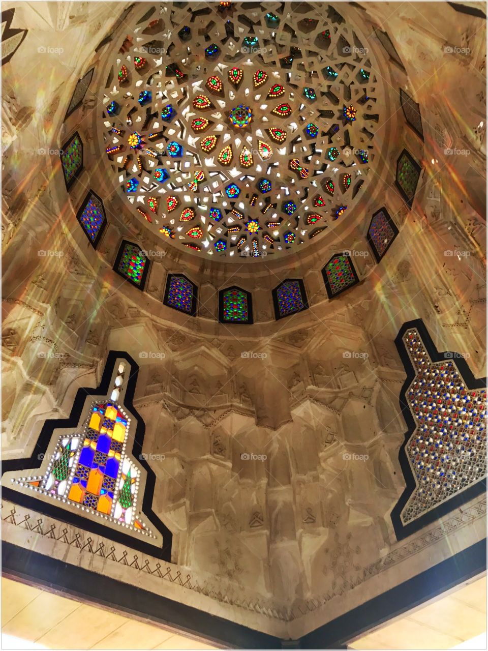 Bayt Al-Suhaimy, Cairo, Egypt. Shows a shed inside the garden of the house, the shed has a dome decorated with islamic patterns and colored glass. Sunrays reflect through these colorful patterns creating outstanding shadows ❤️