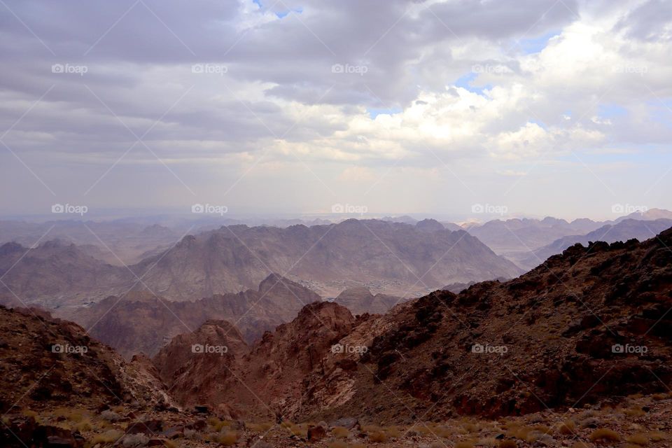 Red mountains of Sinai desert at cloudy day