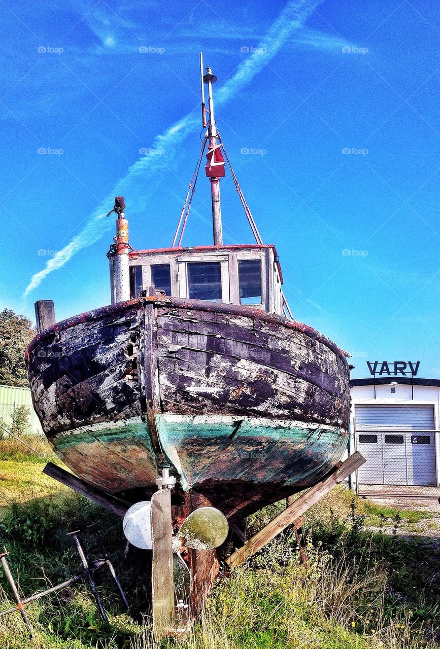 Old boat on land