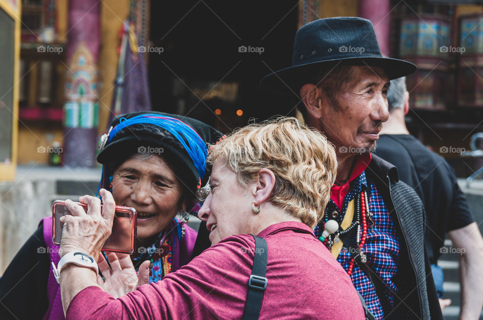 tibetan and tourist portrait