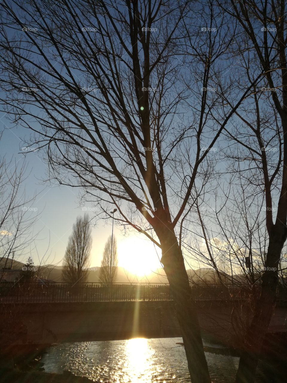 Sunset on the river after a very windy day