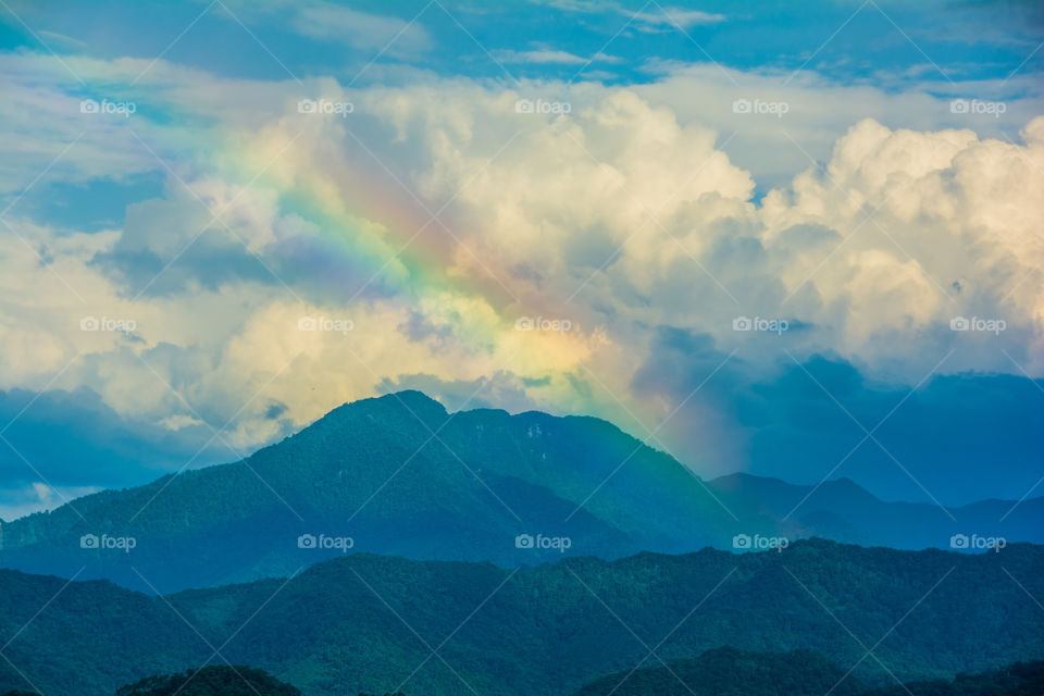 Beautiful rainbow on the mountain landscape