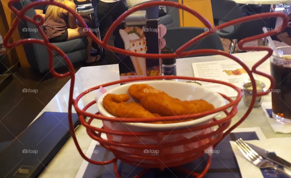 Chicken fingers in a chicken shaped basket