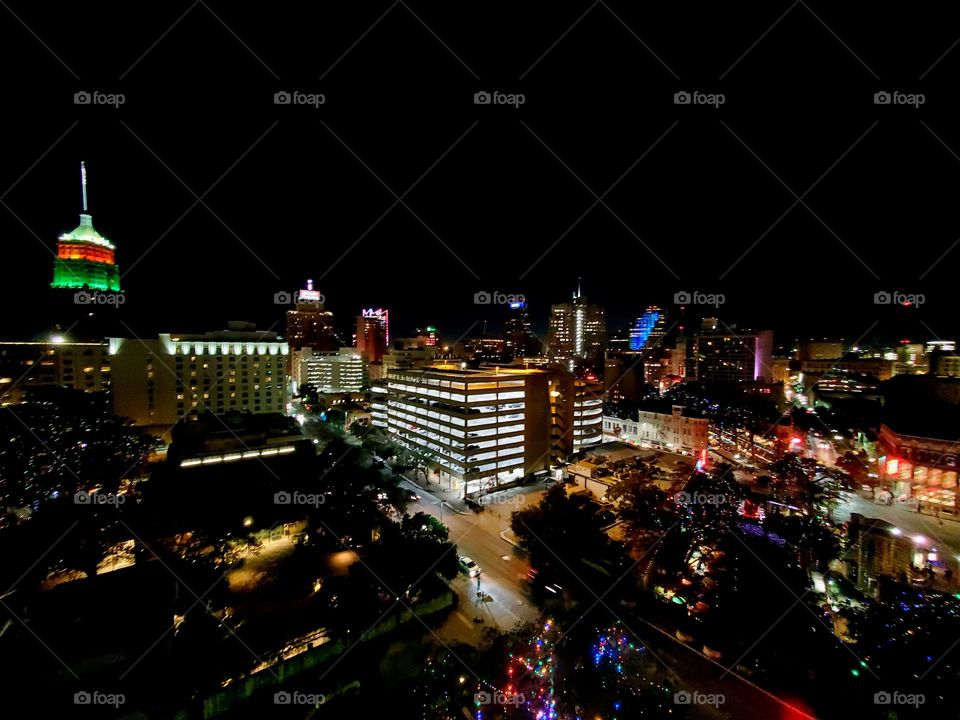 Night view of the colorfully illuminated downtown San Antonio TX