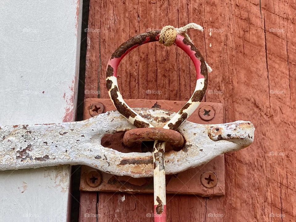 The lock on an old barn door