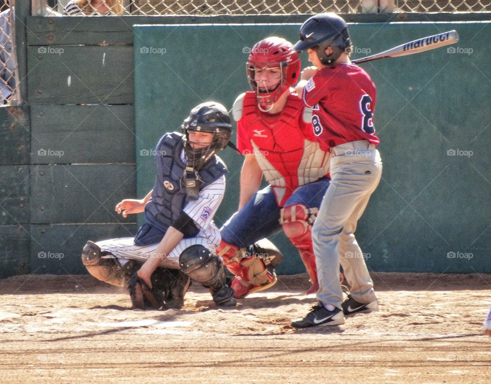 Young Ball Players At Home Plate