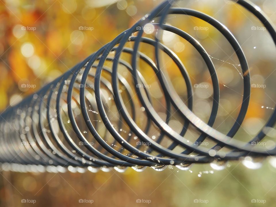 Wet wire in the form of a spiral