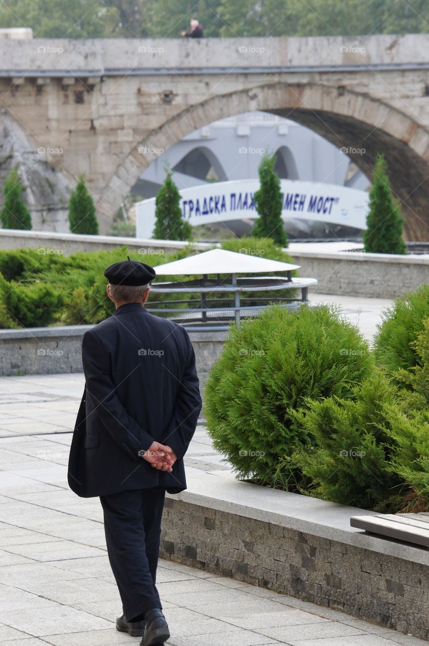 Old man inspecting the surroundings 