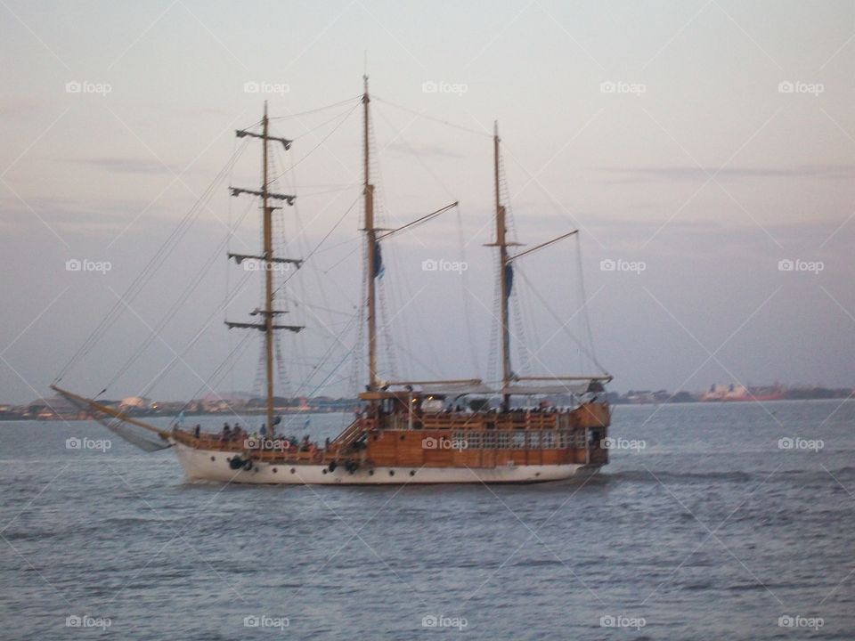 Evening pirate ship sailing around Ecuador