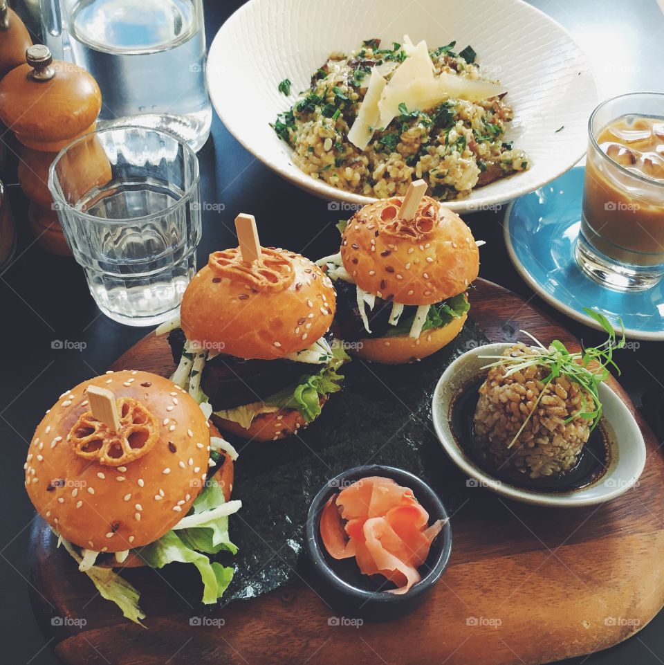 Sliders, risotto and a latte in a cafe in Melbourne, Australia.