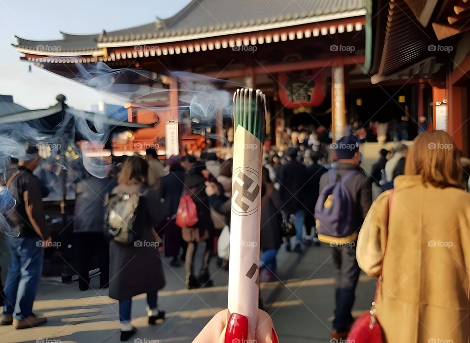 Rituals, incense lighting, respect and worship in Japanese temples