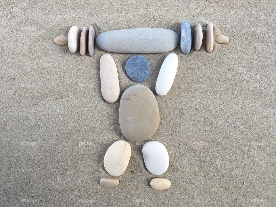 The weightlifter, pebbles composition