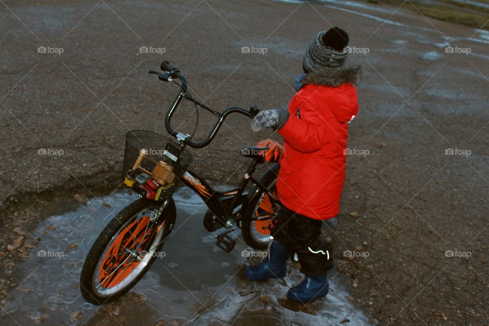 Kid with bicycle