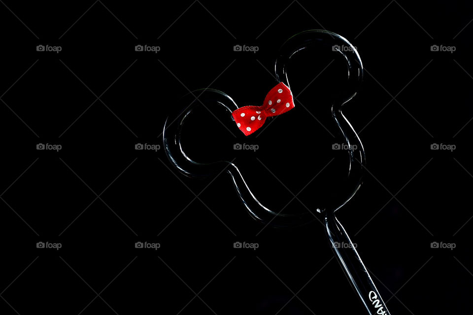 Mickey mouse shape toy on black background