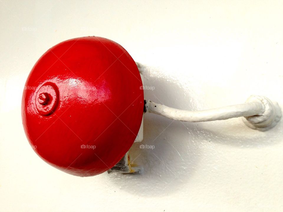 Red emergency bell on cruise ship