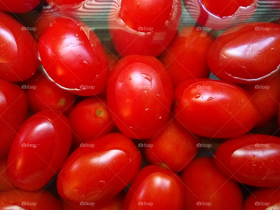 Tomato Rinsed in Sink