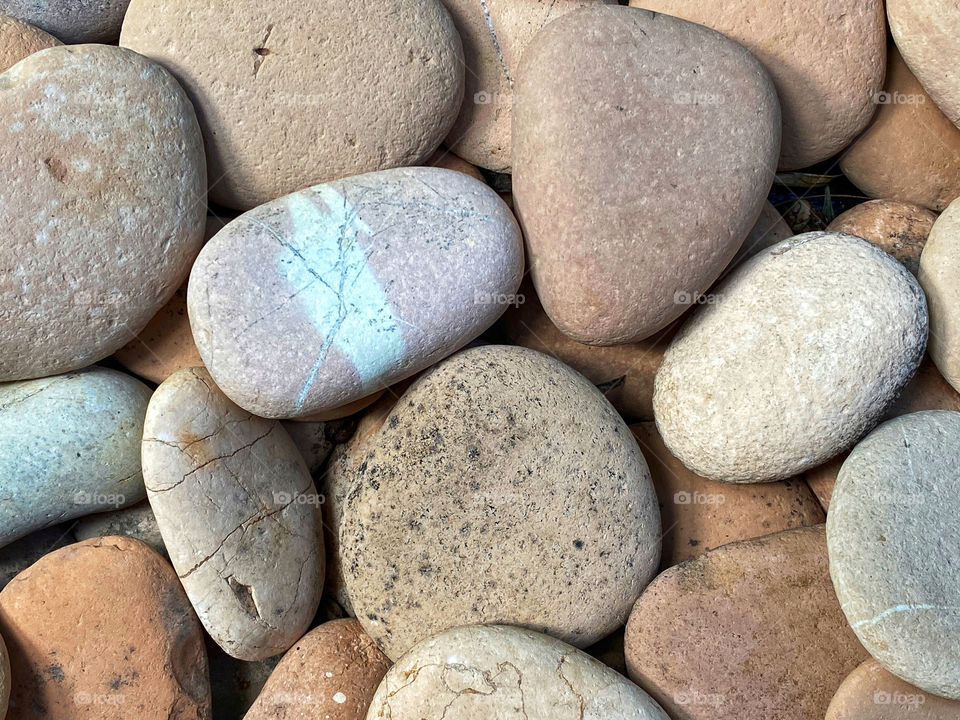 Smooth river stones closeup 