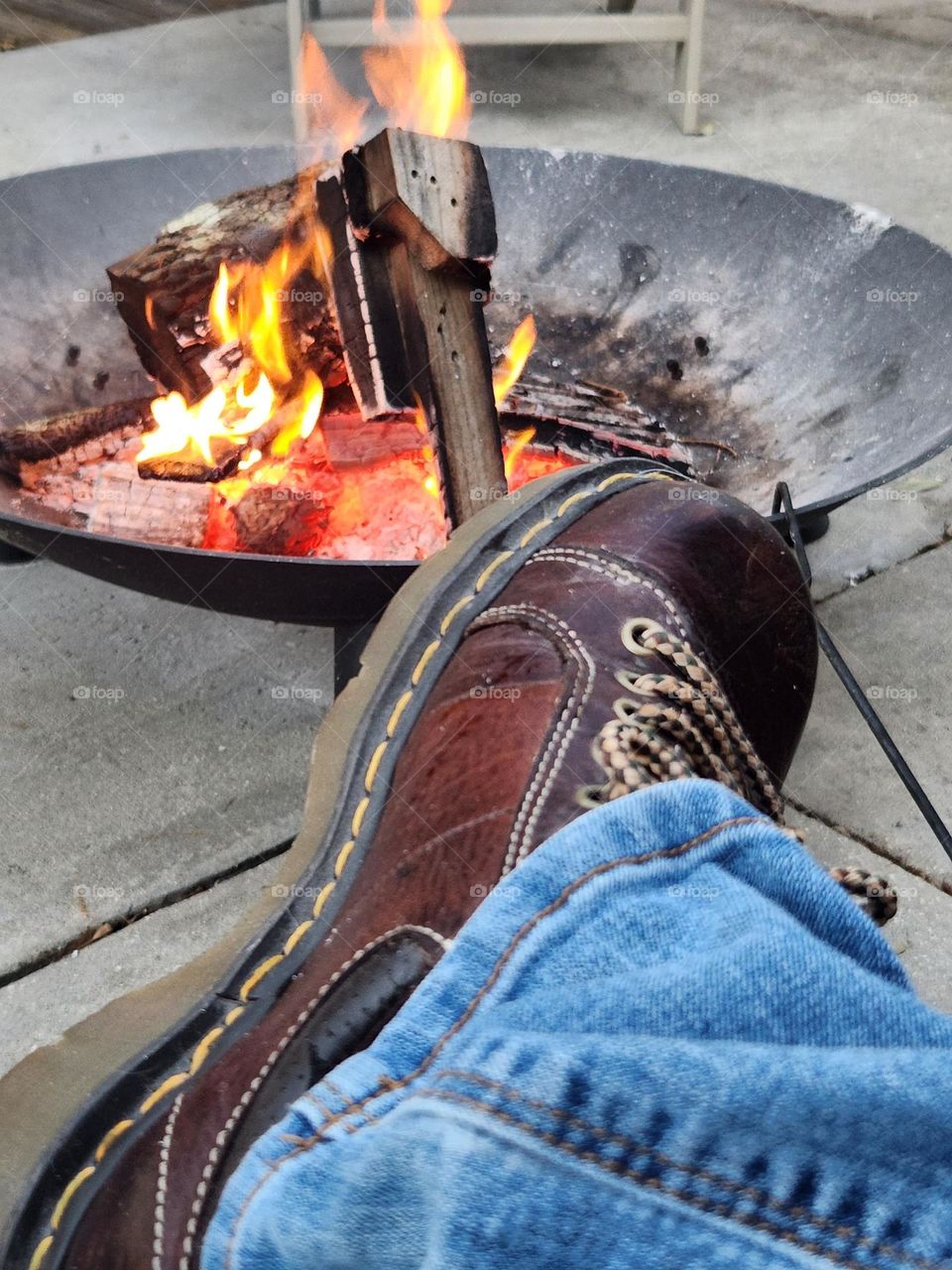 Lounging outside by the fire pit in my Docs