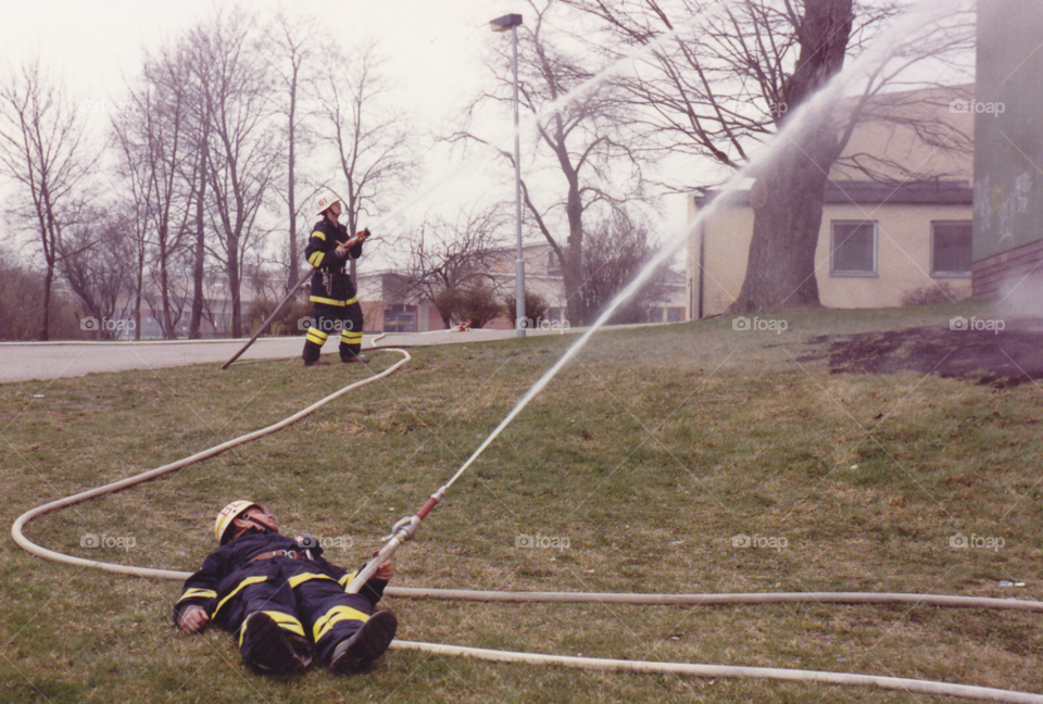 water fire hose firefighters by MagnusPm