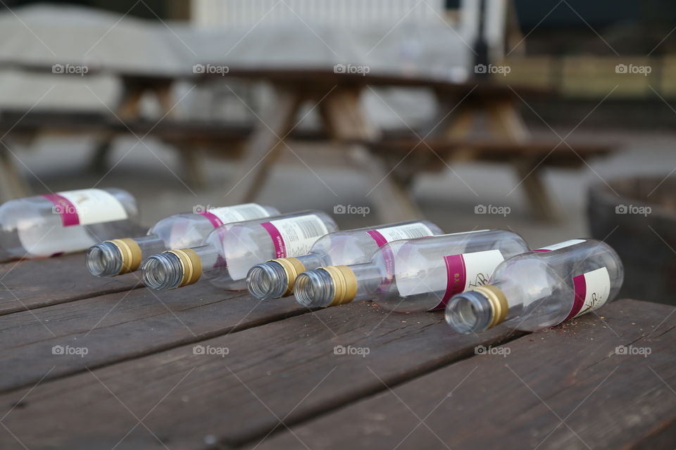 Empty bottles laying in a row