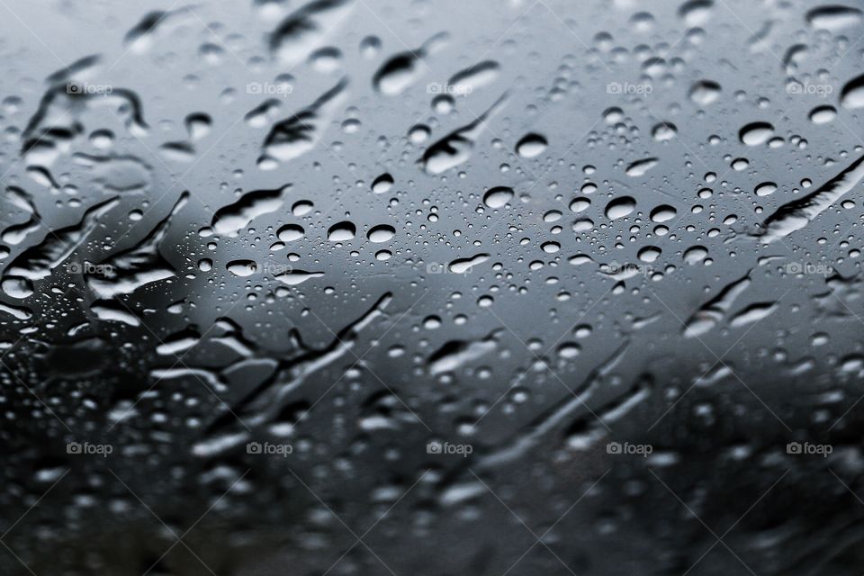 Full frame shot of wet glass window