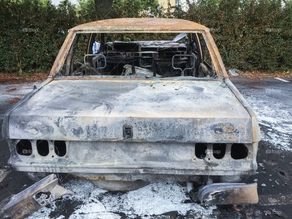 burned-out car in Sweden.