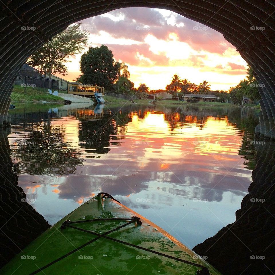 View of boat bow and lake