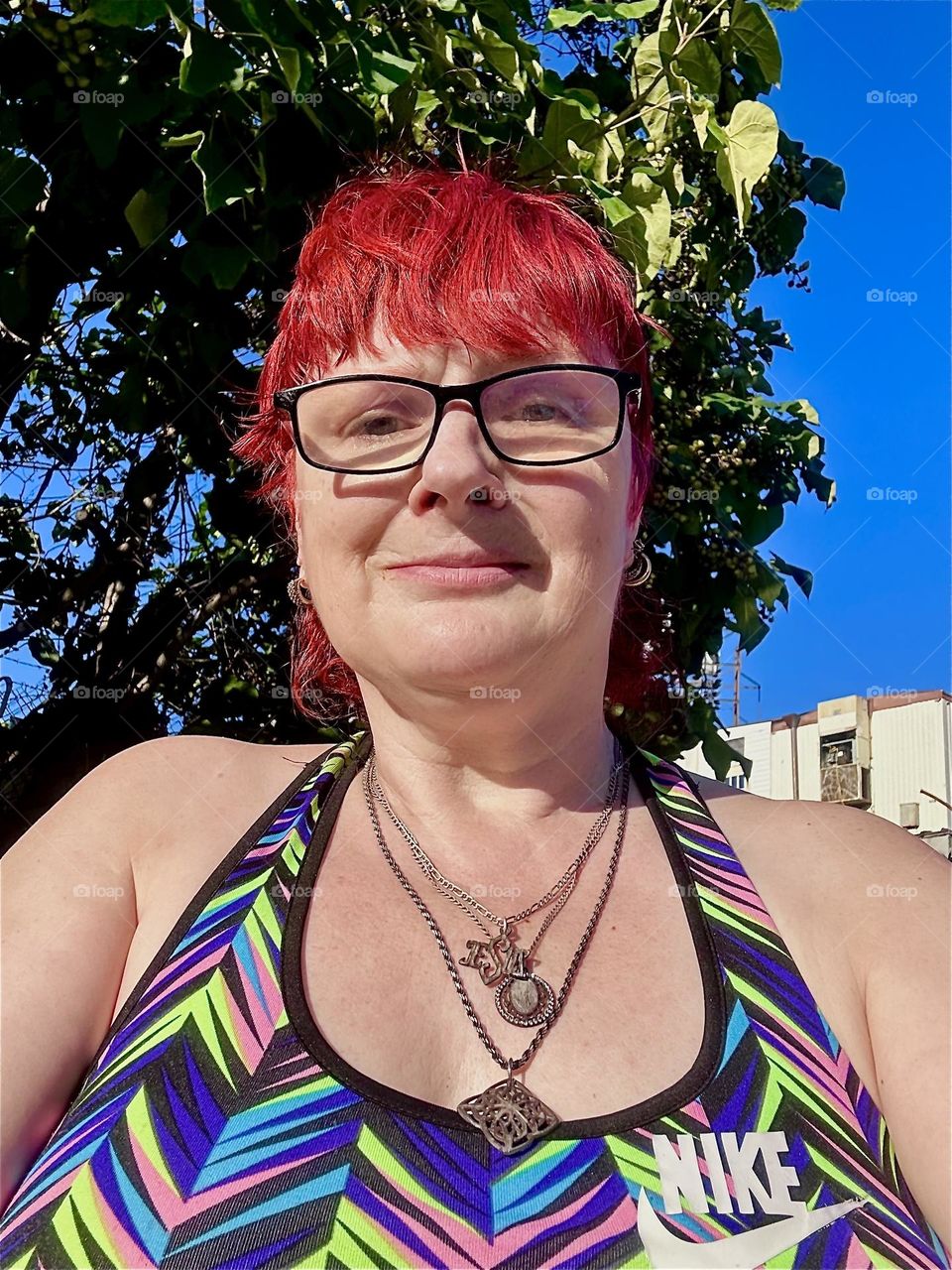 Standing outside on the front deck of “Salvation”, our “28 foot 1969 Luhrs” cabin cruiser houseboat at “Newtown Creek” by the “Pulaski Bridge” in LIC, Queens this is me, “Petra Schiller” a.k.a. “Maxine Firefox”. 2024. Hypnotic Productions