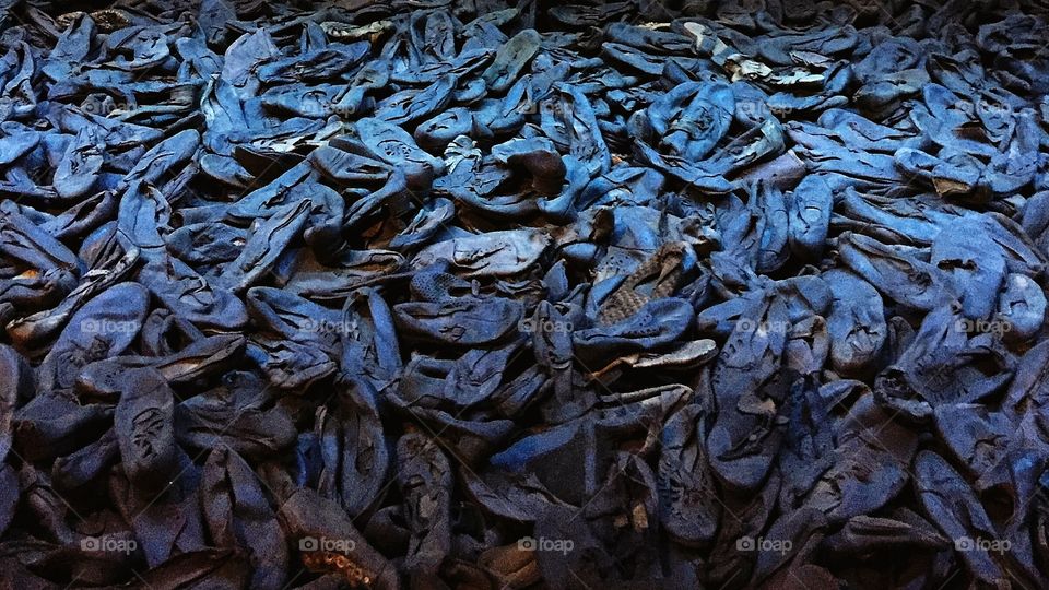 Thousands of old blue shoes