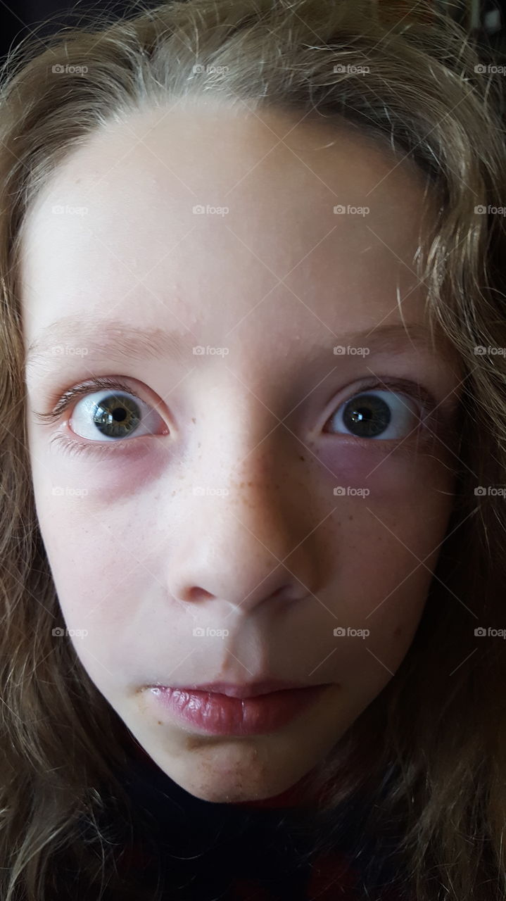 close up of child's serious face