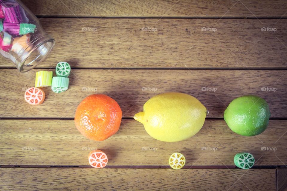 Boiled sweets and fresh fruits