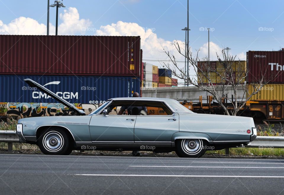 A couple driving a 1972 4 door special collectors edition Buick Electra experience car trouble and are stranded and broke down on the New Jersey turnpike northbound.