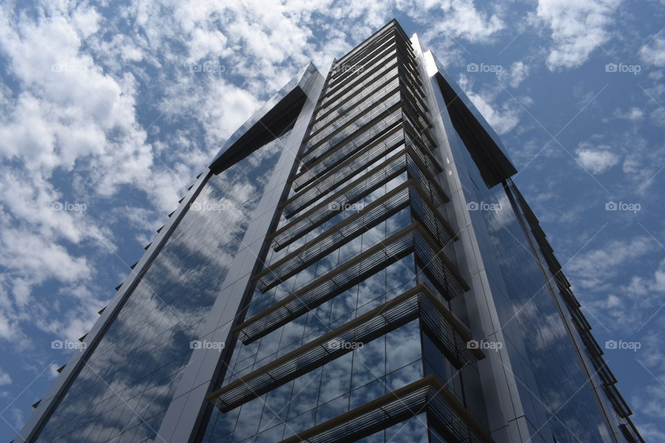 Reflected clouds in building
