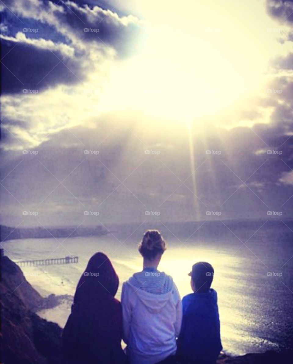 3 plus 1 equals 4. my 3 youngest kids photographed by the oldest at the cliffs in La Jolla, California