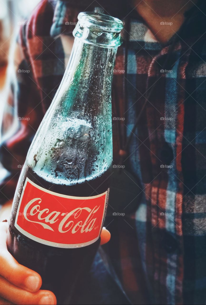 drinking Coca-Cola