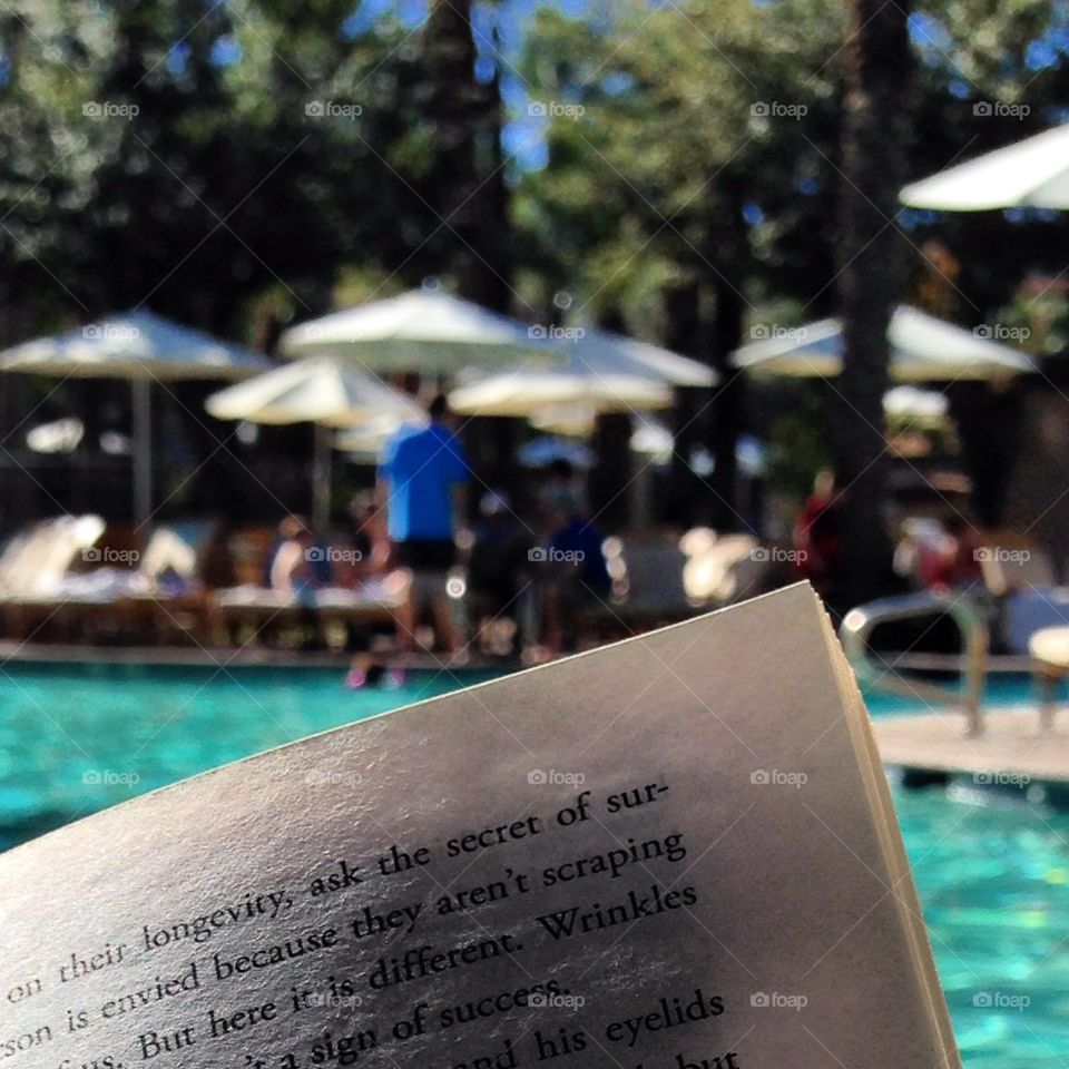 Reading by the Pool