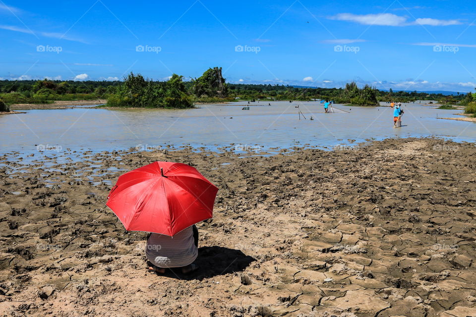 people with red umbrella