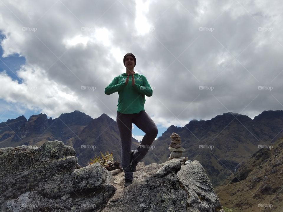 Namaste on the mountain. Top of Dead woman's pass in Peru