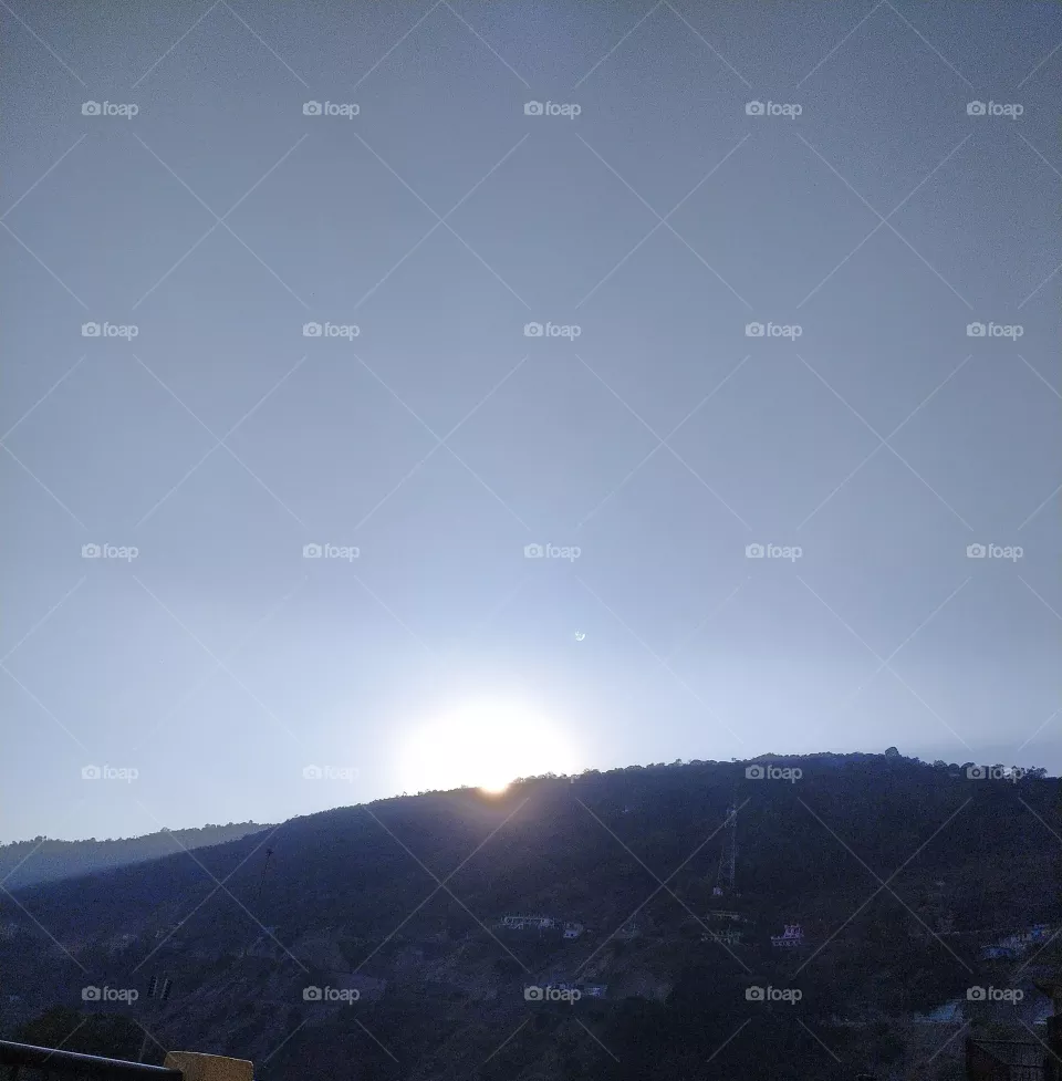 The sun going behind the mountains